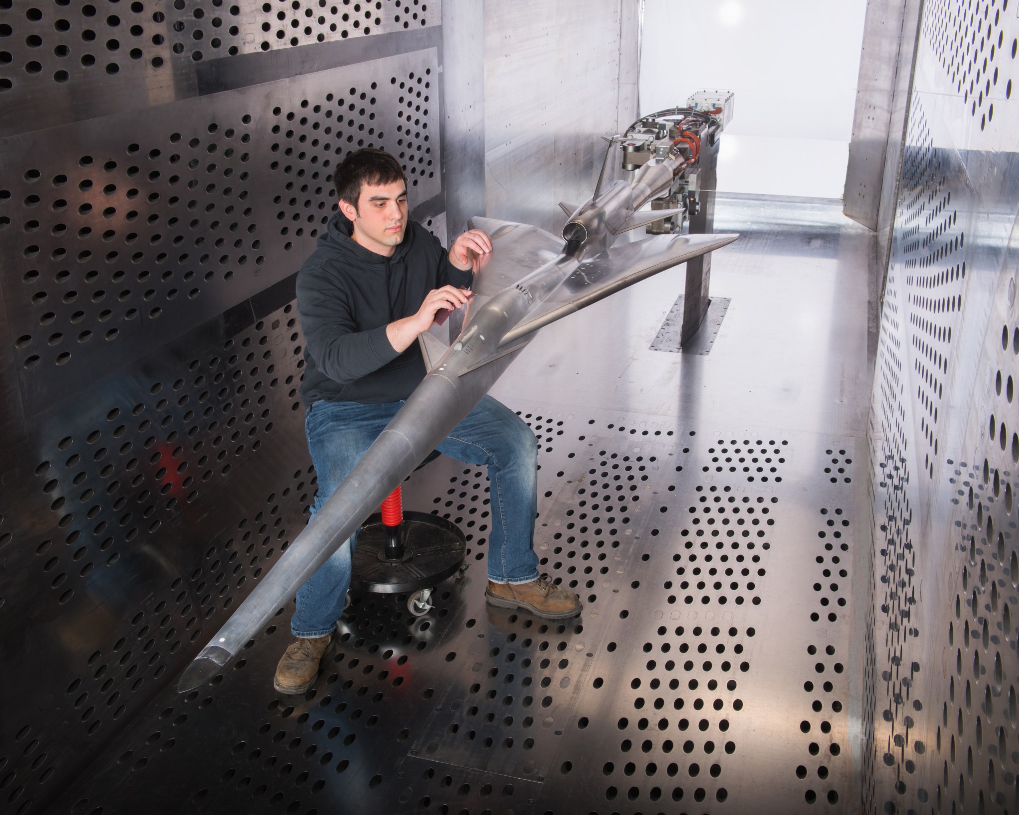  A NASA Glenn technician prepares the QueSST experimental aircraft