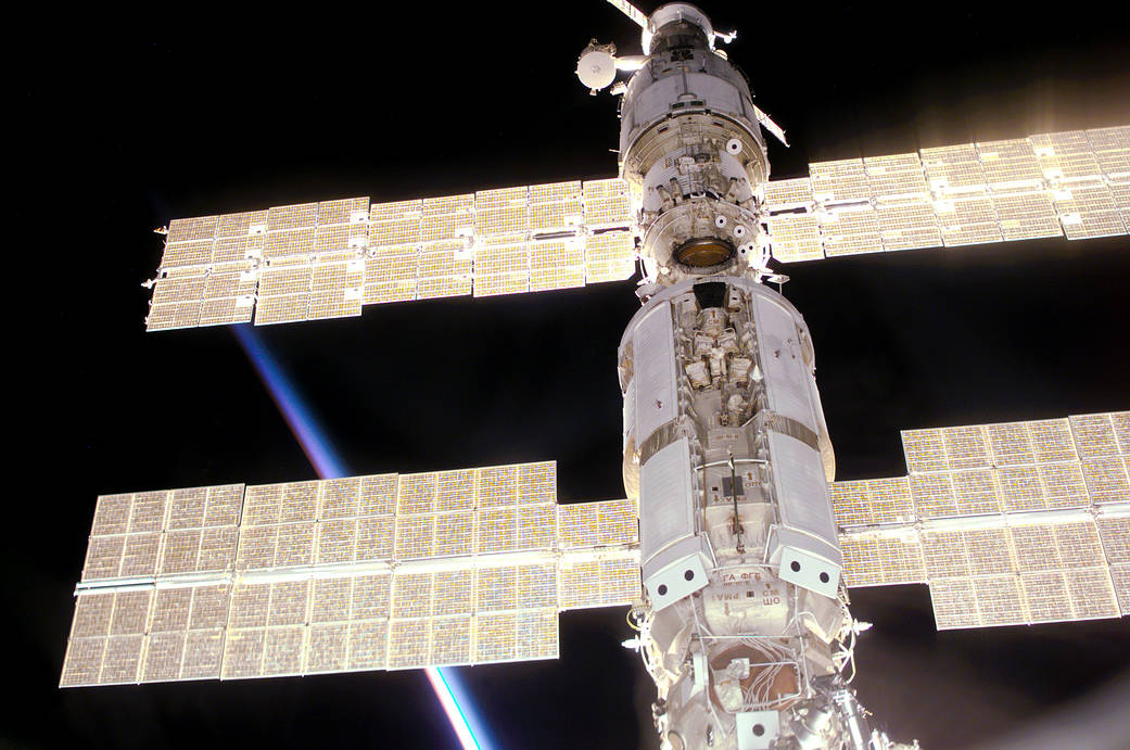 Space Station modules connected with solar arrays extended