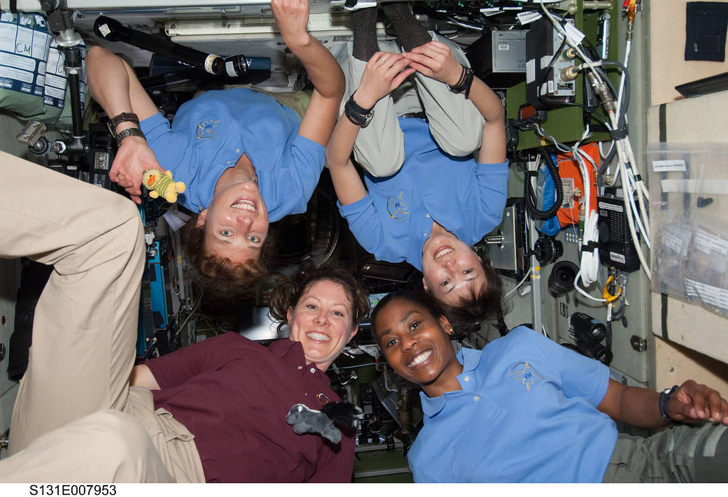 Four women pose for photograph aboard International Space Station