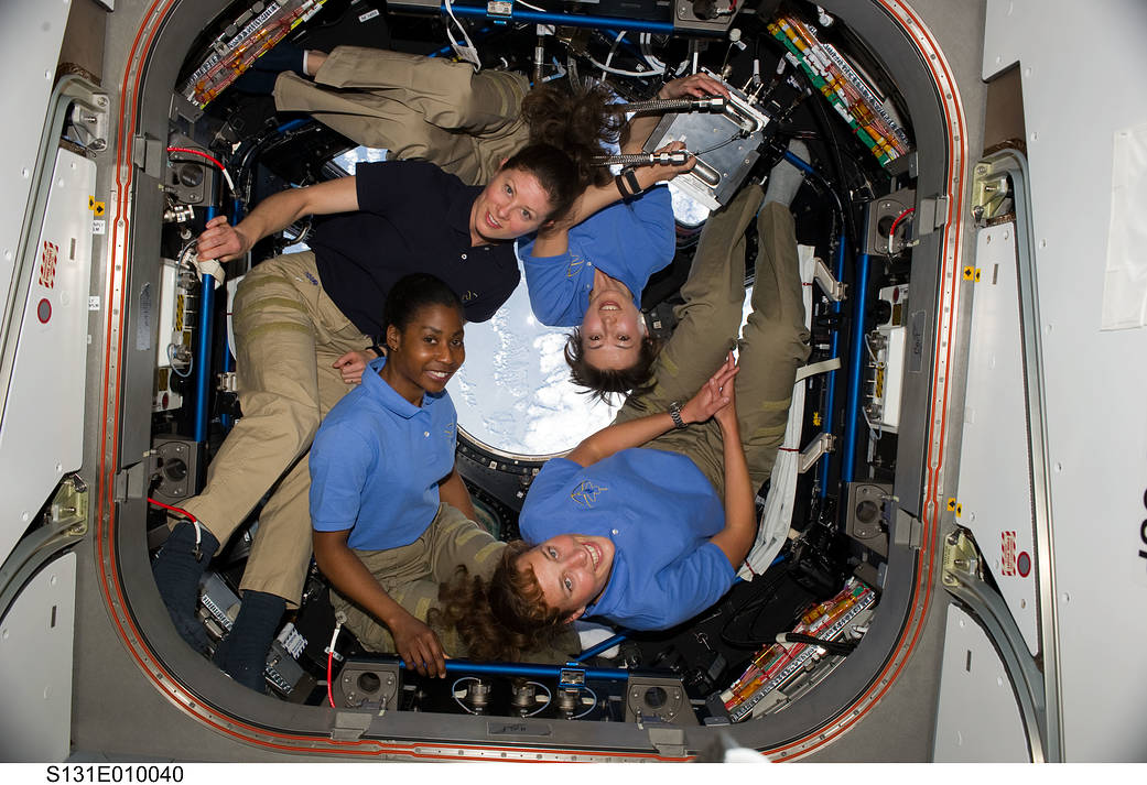 Four women astronauts pose for photo inside space station cupola
