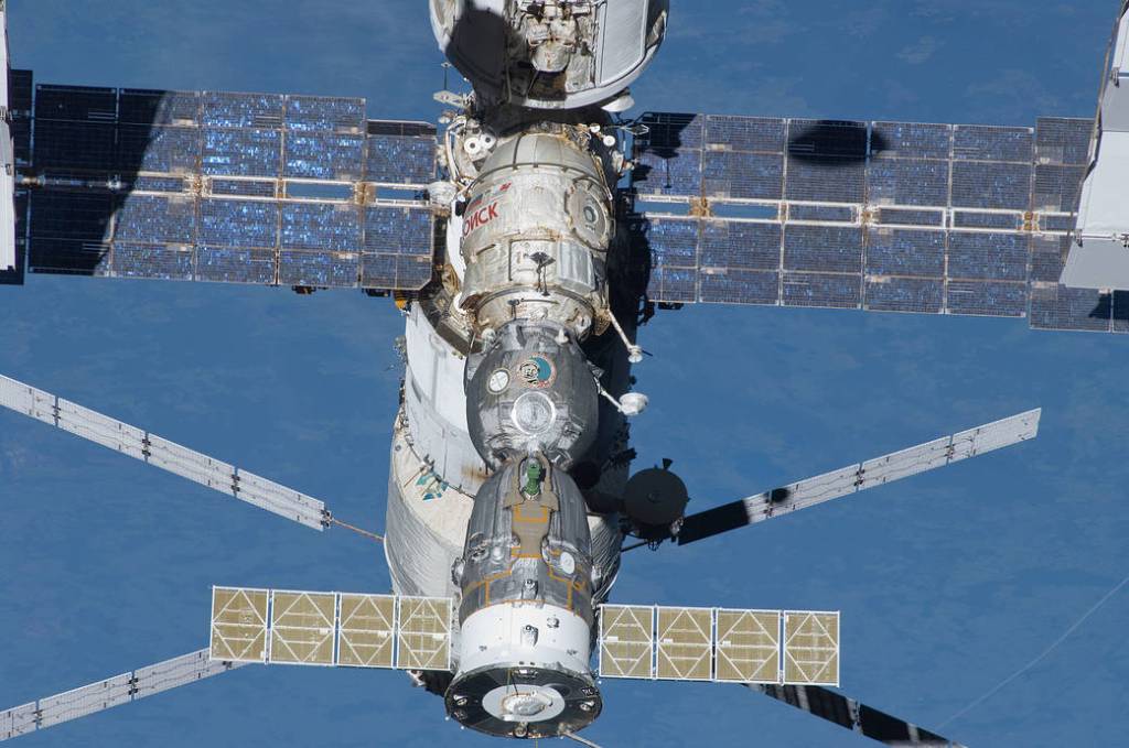 A portion of the International Space Station’s Russian segment is pictured with docked spacecraft