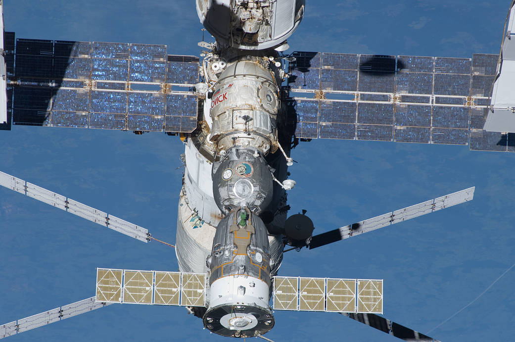 A portion of the International Space Station's Russian segment is pictured with docked spacecraft