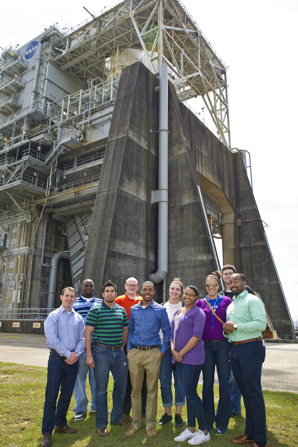 Stennis interns in front of test stand