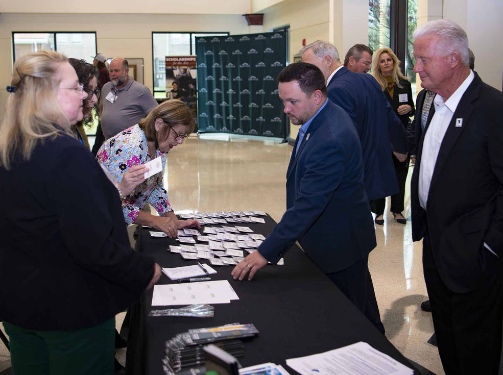 Participants sign in at the 11th annual NASA Stennis Space Center Director's Community Briefing