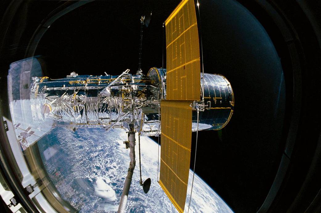 In 1990, the Hubble Space Telescope was deployed from the cargo bay of space shuttle Discovery.