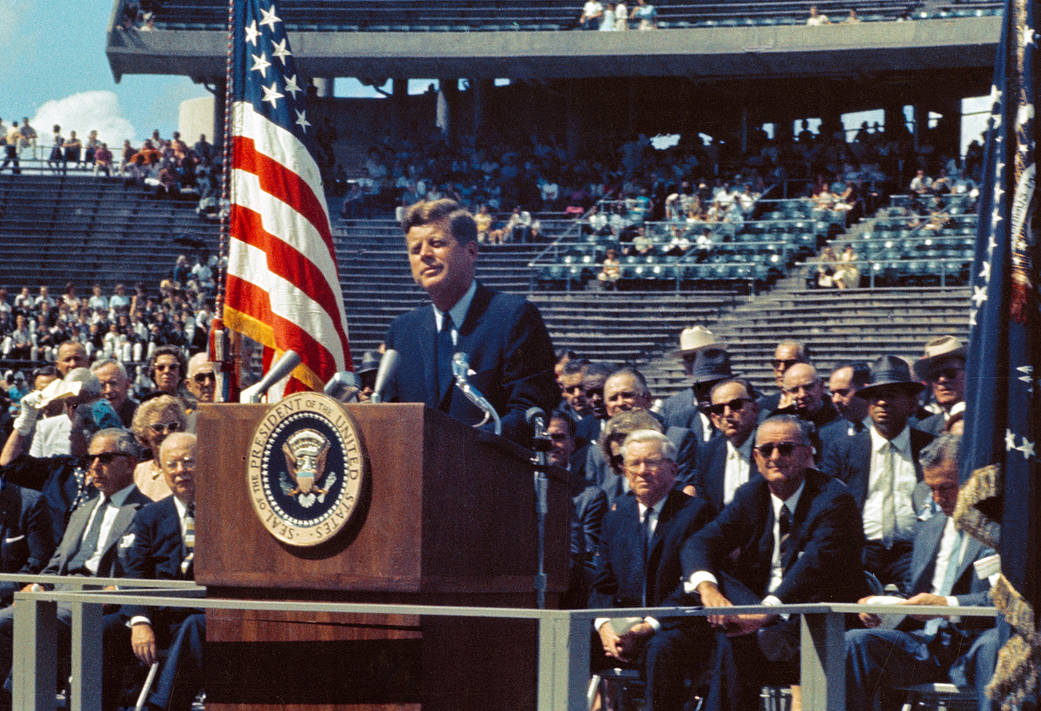 President Kennedy tells a crowd of 35,000 at Rice Stadium, Houston, Texas, "We intend to become the world's leading spacefaring 