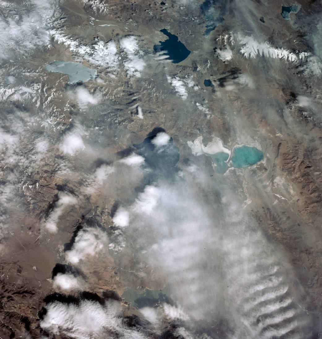 Photograph from Earth orbit of mountainous terrain with lakes