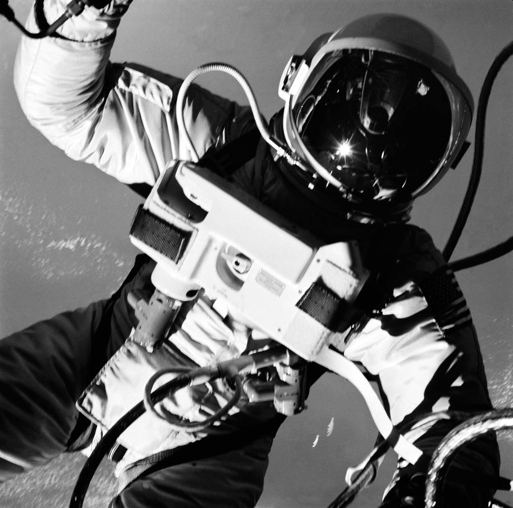 Astronaut in spacesuit on spacewalk, black and white image