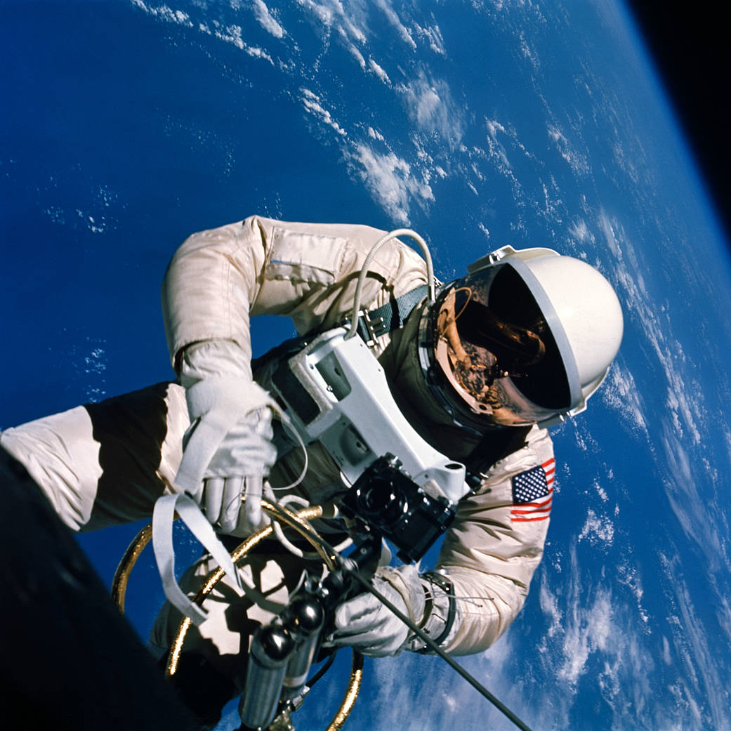 Astronaut Edward H. White II floats outside Gemini spacecraft