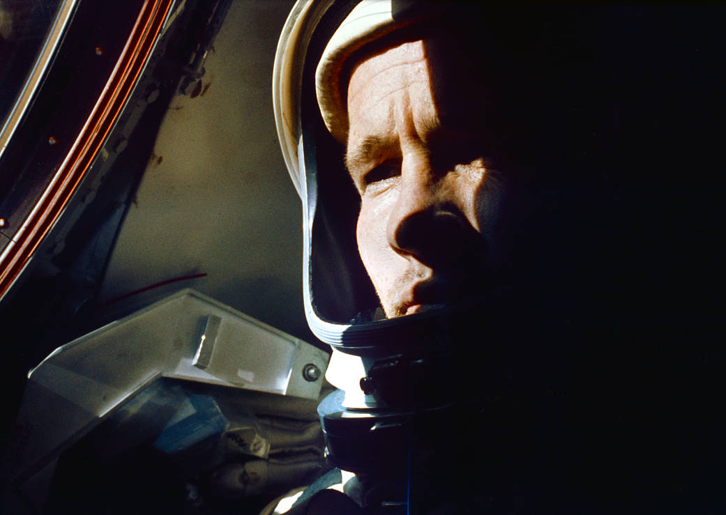 Closeup of face of astronaut Ed White wearing helmet