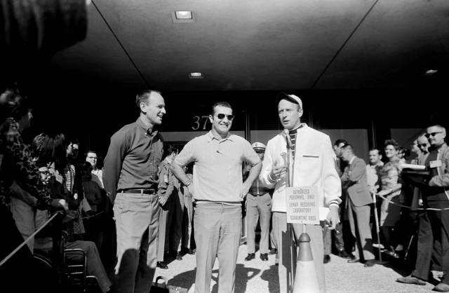 Three Apollo 12 astronauts are welcomed after release from quarantine