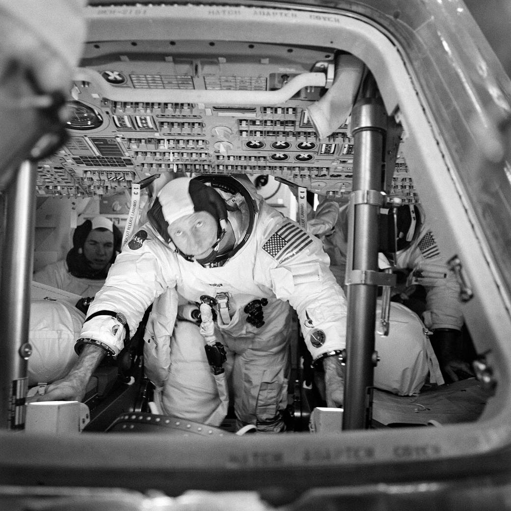  The three Apollo 15 prime crew members can be seen inside the Apollo 15 Command Module (CM) during simulation training at the K