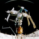 STS-74 crew members used an IMAX camera to document the Space Shuttle Atlantis' rendezvous and docking with the Mir Space Station.