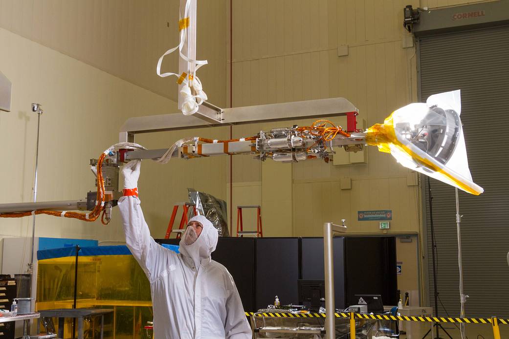 Man in protective clothing and equipment on crane