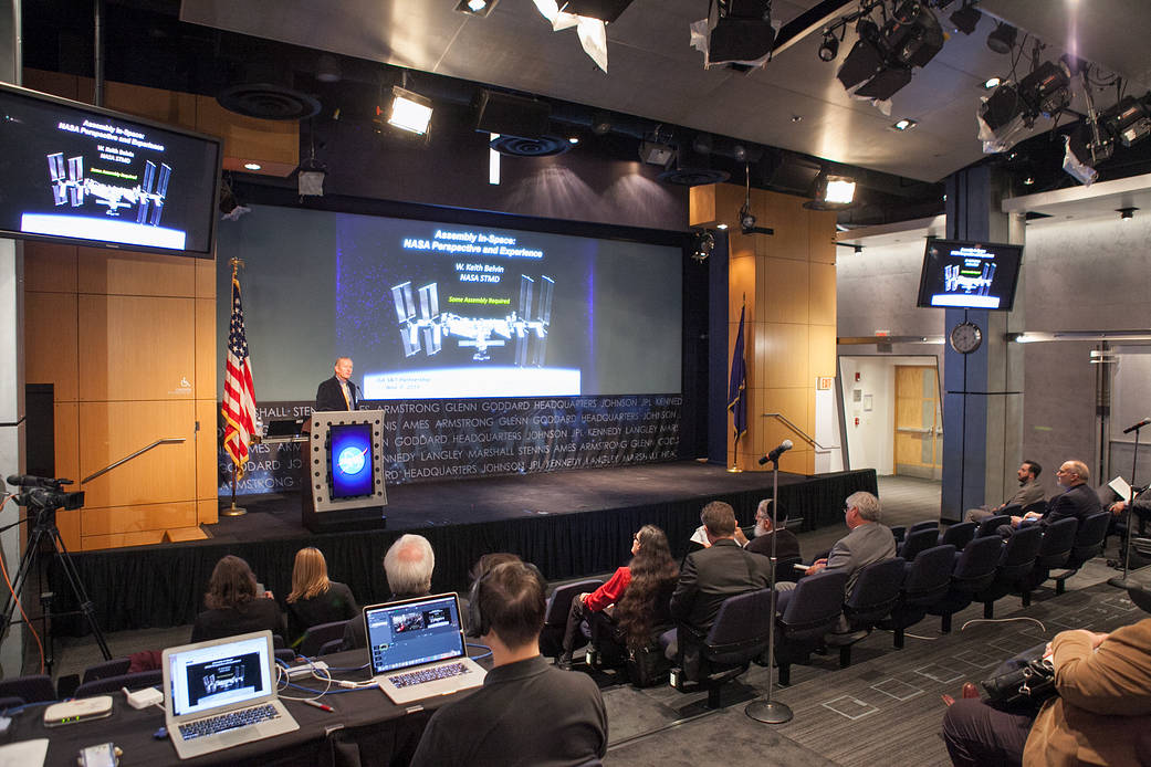 People listen to a talk