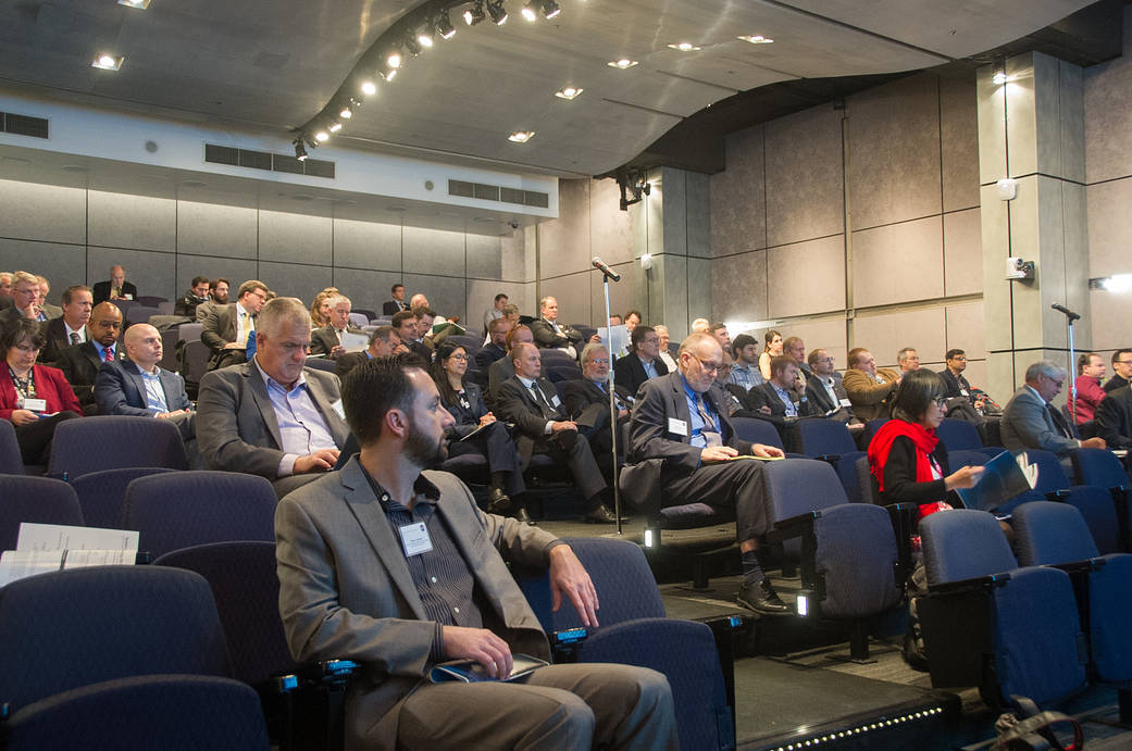 People listen to a talk