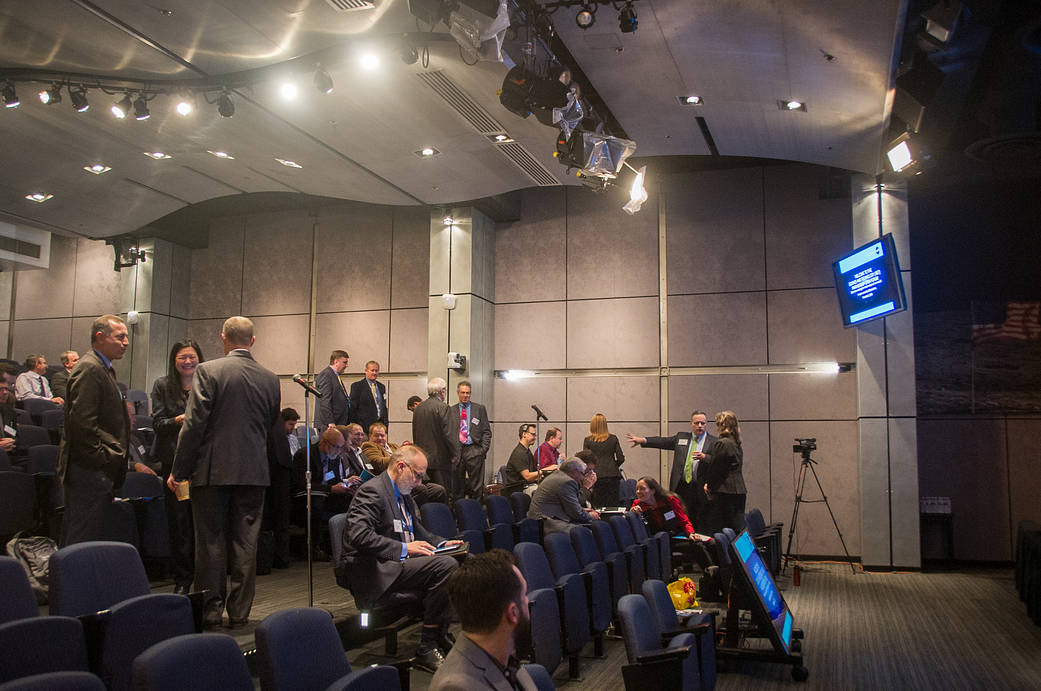 People listen to a talk