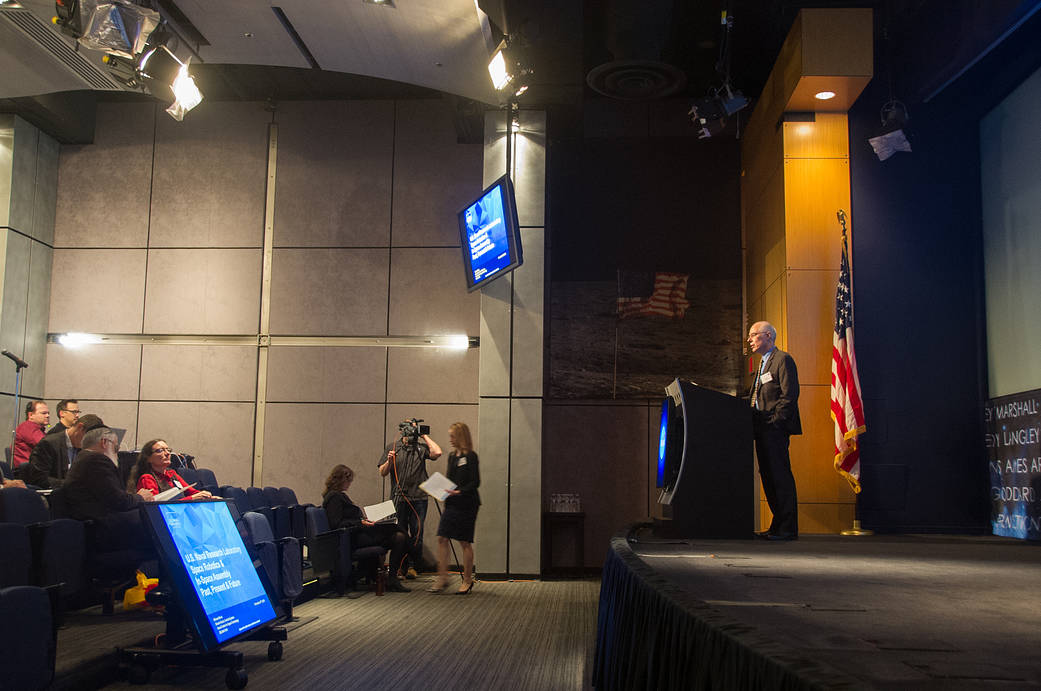 People listen to a talk