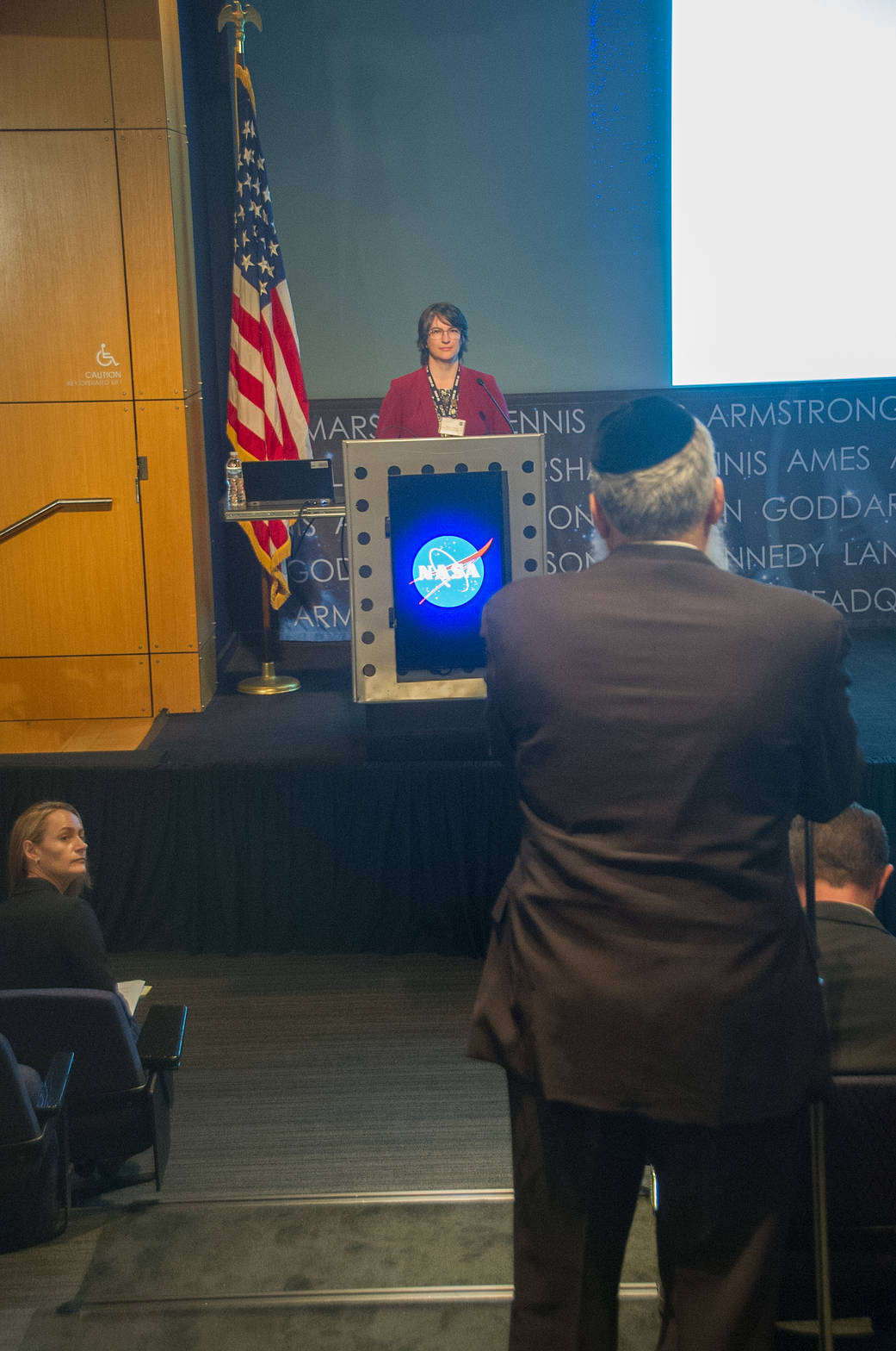 People listen to a talk