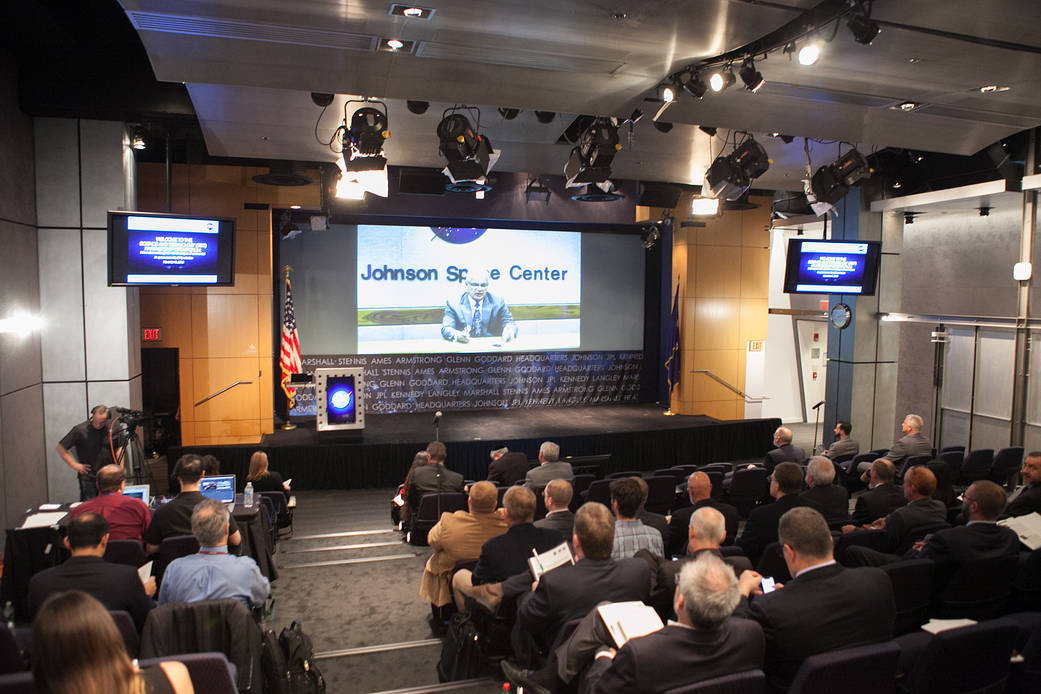 People listen to a talk