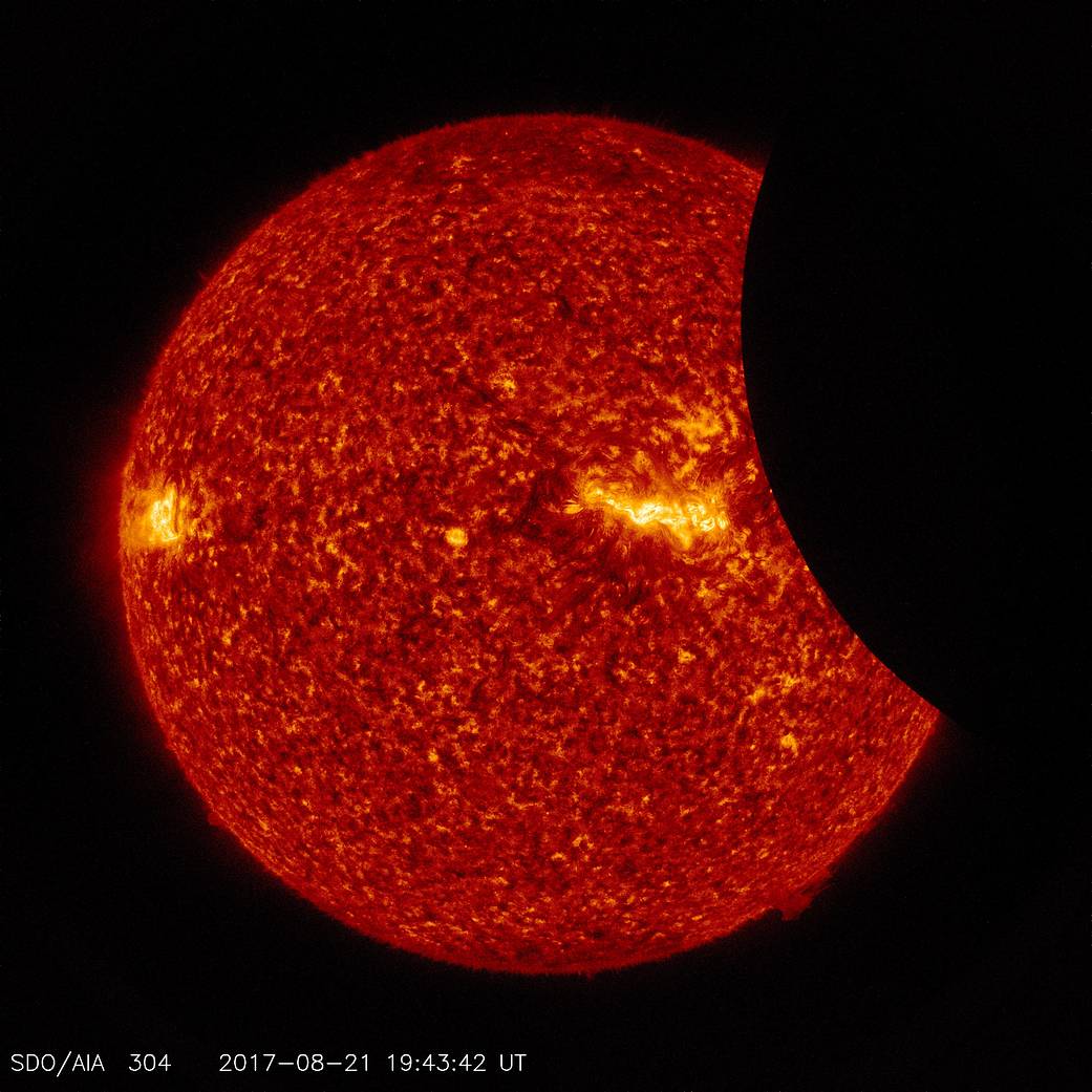 image of moon crossing in front of the sun, from SDO