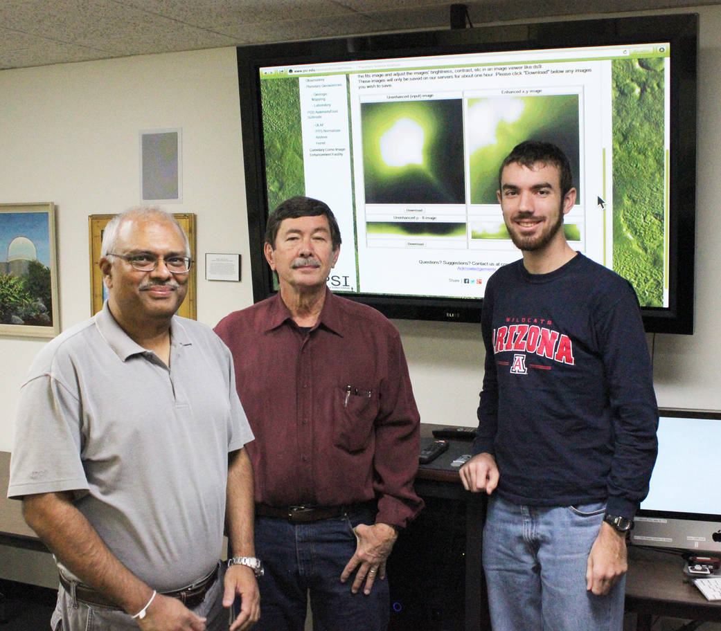 (Left to right) Nalin Samarasinha, Stephen Larson, and Patrick Martin in front of a display showing the results from the Web fac