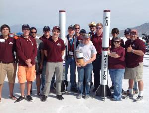 The Mississippi State University in Starkville team poses with their rocket