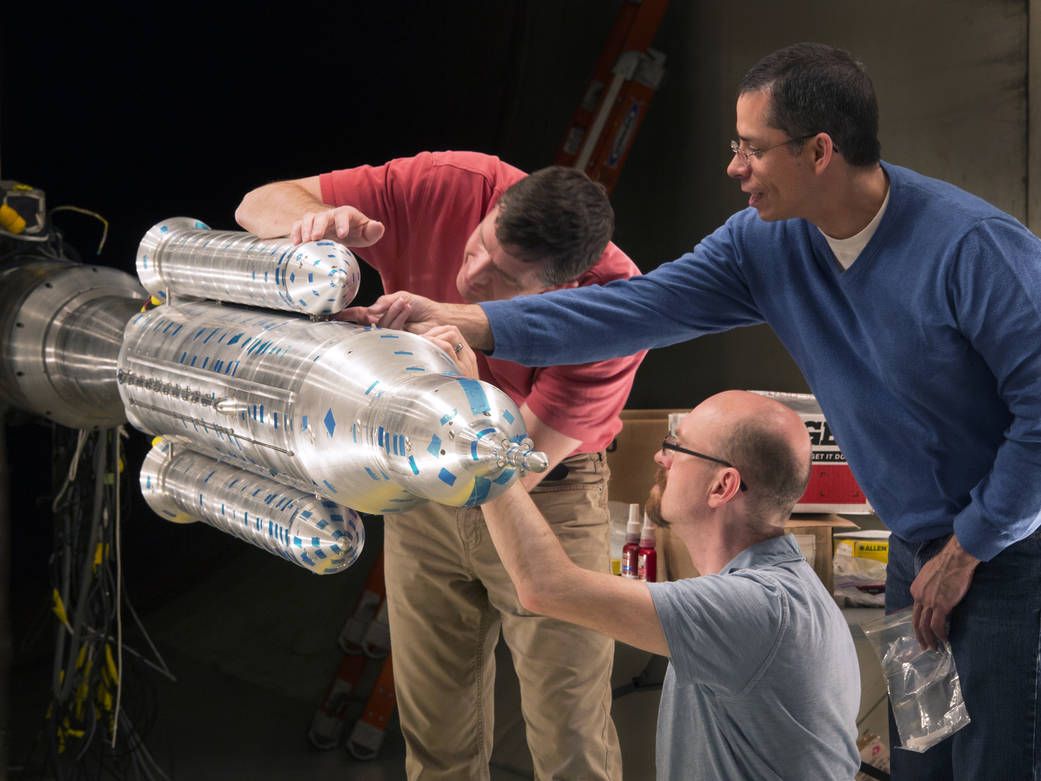 The aerodynamics team at NASA Langley tests a model of the 70-metric-ton Space Launch System