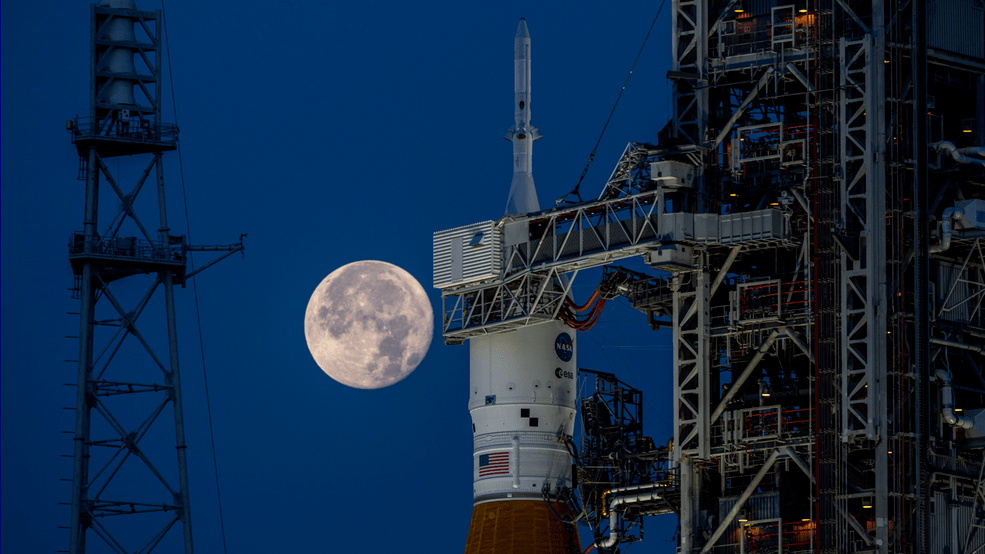 SLS at the Pad with the Moon