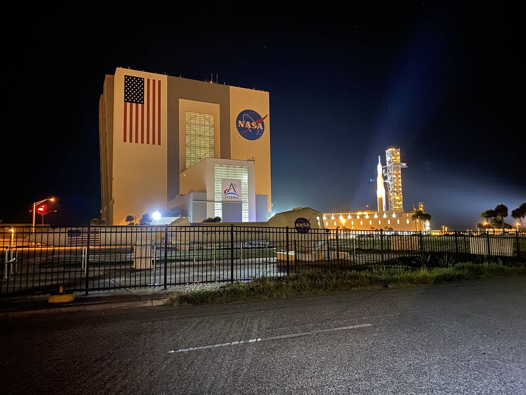NASA’s Space Launch System (SLS) rocket with the Orion spacecraft leaves the Vehicle Assembly Building atop a mobile launcher on June 6, 2022, at NASA’s Kennedy Space Center in Florida. 