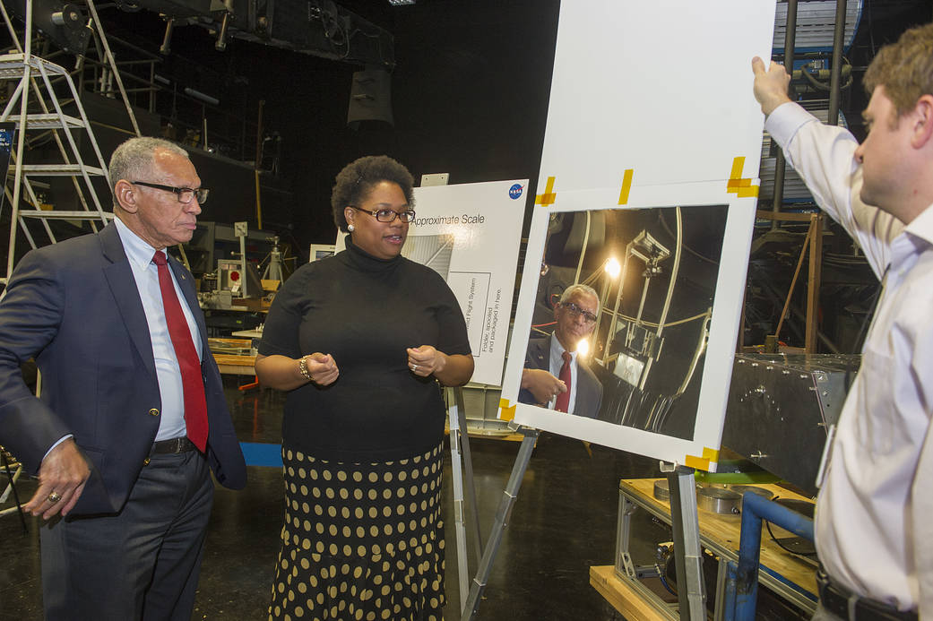 Picture of Administrator Bolden viewing a pristine sample of the NEA Scout solar sail