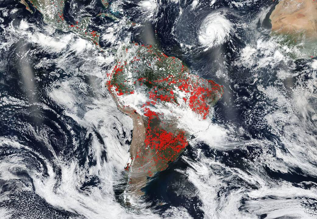 Suomi NPP image of Hurricane Lorenzo and South America on fire
