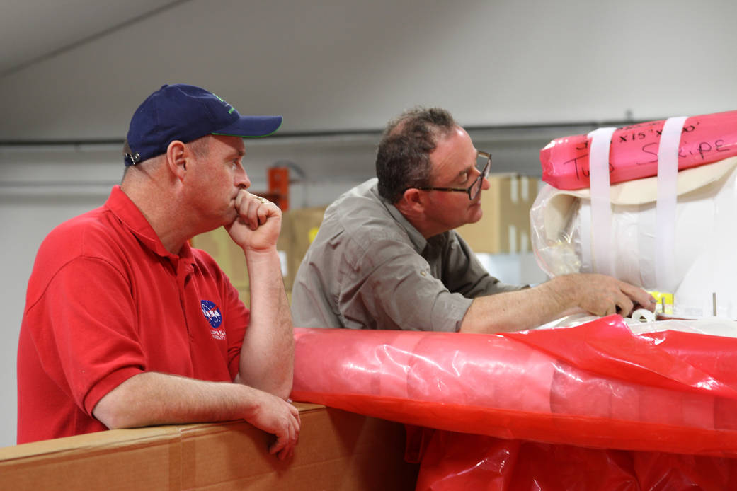 Engineers prepare the top of the test balloon