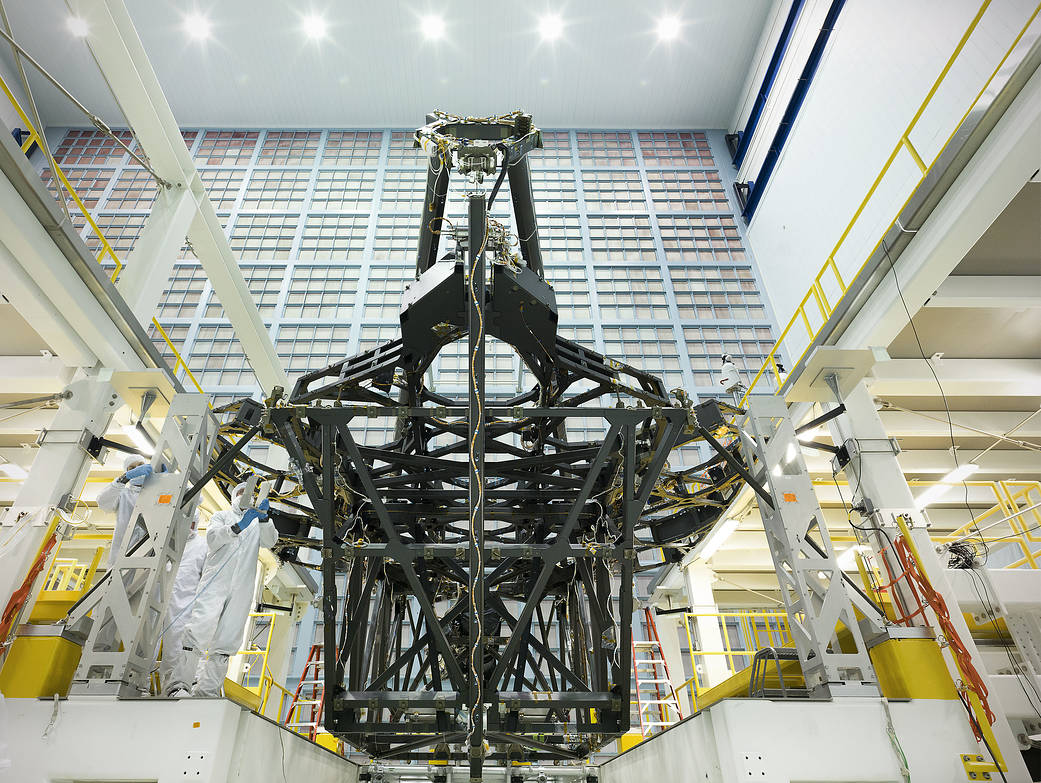 The Webb telescope team is preparing to begin placement of all 18 of the telescope's primary flight mirrors onto the structure.