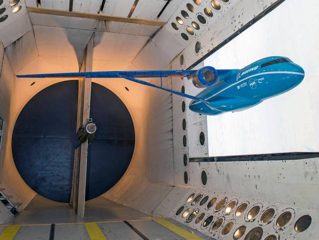 A 15-percent scale semi-span model built by Boeing, in for testing at the NASA Langley Transonic Dynamics Tunnel.