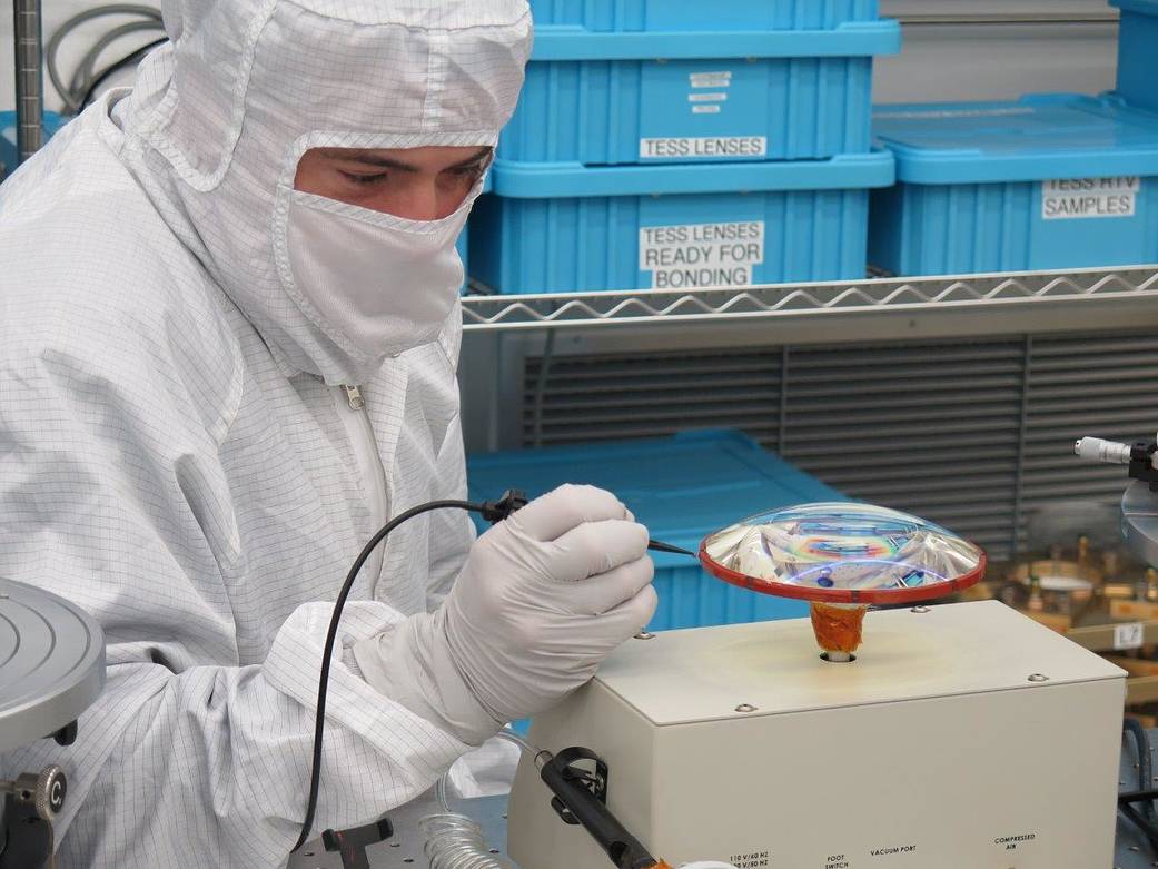 Engineer Applies Room Temperature Vulcanization (RTV) Pads to TESS