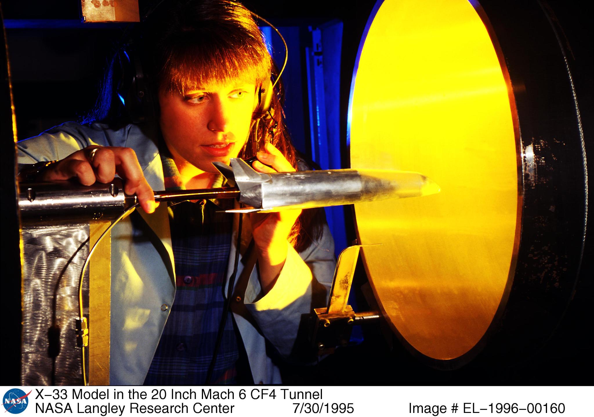 A test model of the X-33 being prepared for testing in the CF4 Tunnel in 1995