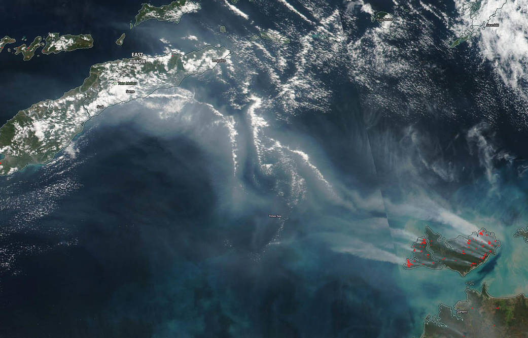 satellite image of fire, plumes of smoke on Tiwi Islands