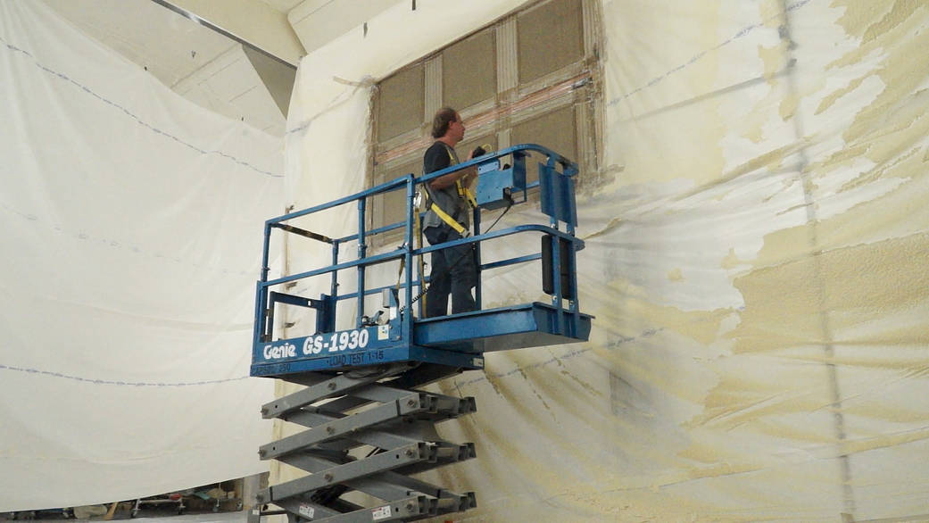 Steve Bray is preparing panels that will be used for testing foam insulation materials for SLS.
