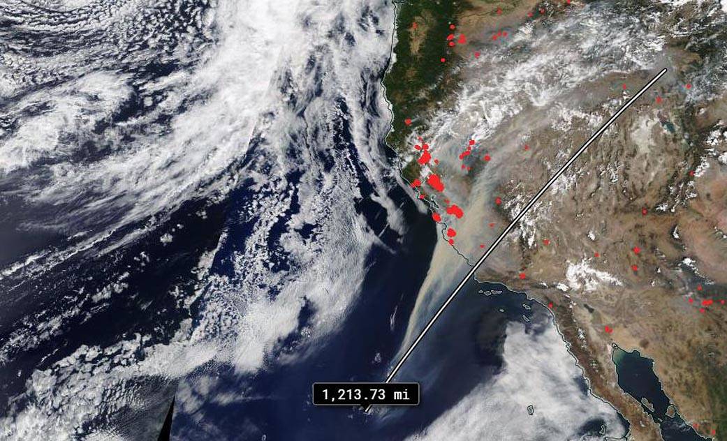 Terra image of 1200 mile trail of smoke from California wildfires
