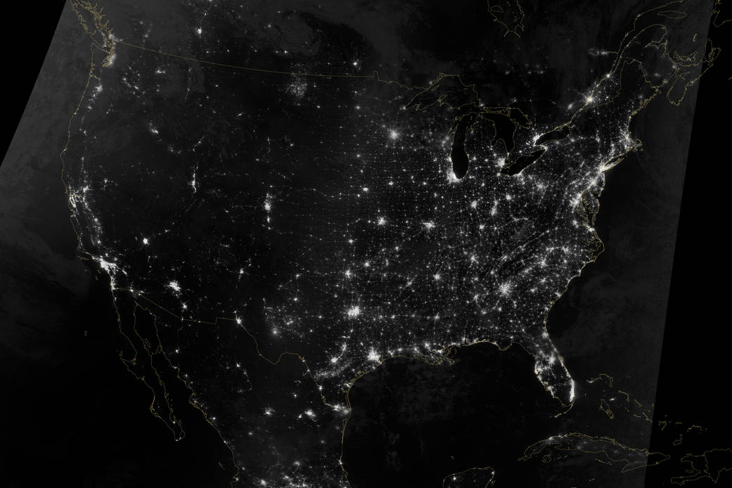 This natural-light, mosaic view of the continental United States is from two nighttime images acquired early on Oct. 1, 2013, by