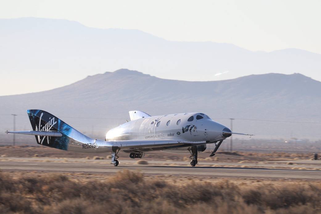 Virgin Galactic SpaceShipTwo returns from its first space flight at Mojave Spaceport in Mojave, California.