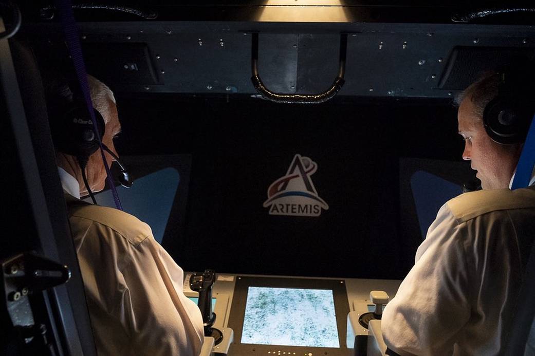 Vice President Mike Pence (left) and NASA Administrator Jim Bridenstine (right) in the Vertical Motion Simulator at NASA's Ames.