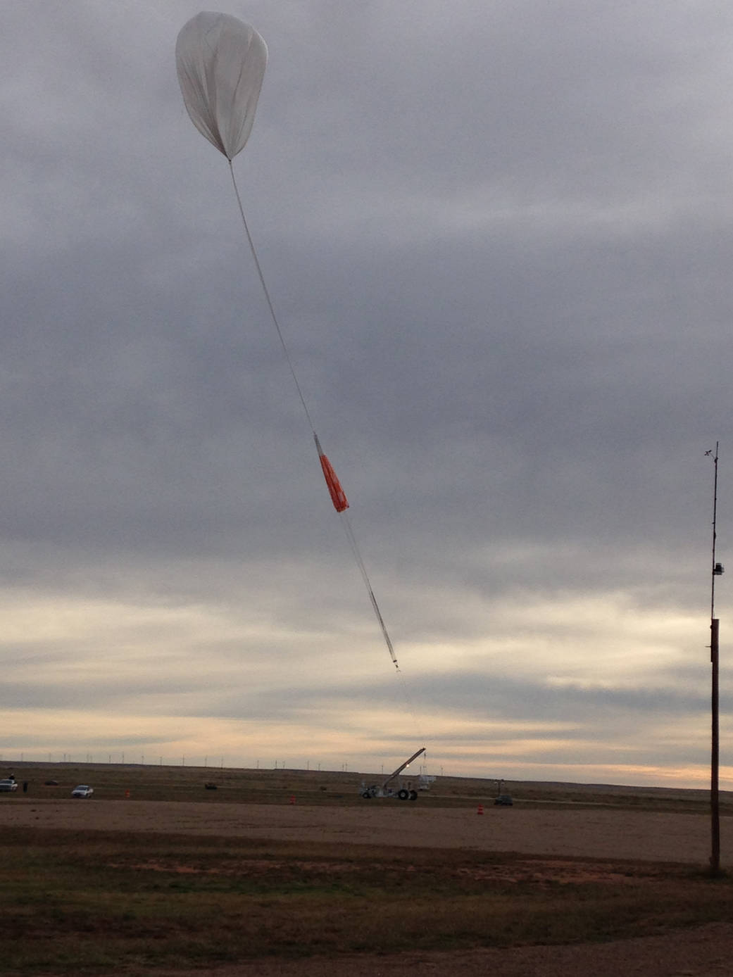 Balloon floats in the New Mexico sky