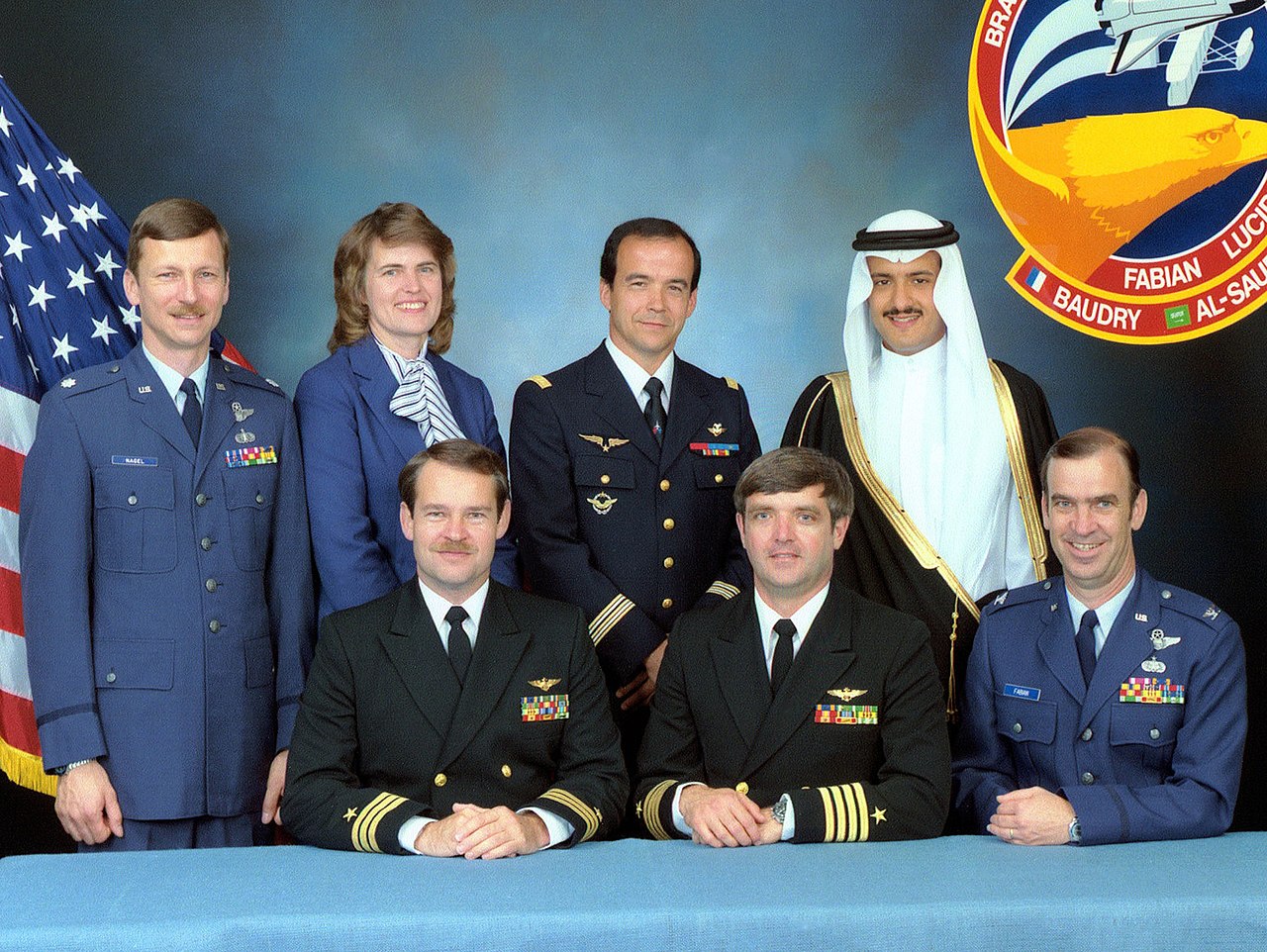 Seven crew members pose for crew portrait