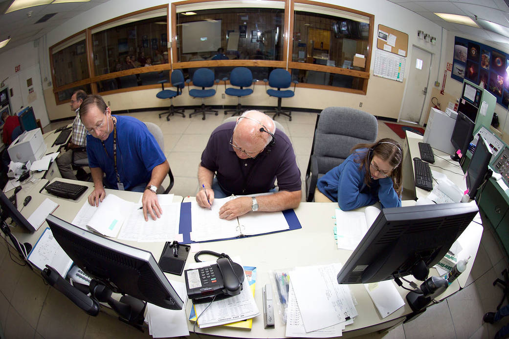 Engineers monitor a propulsion system test. 
