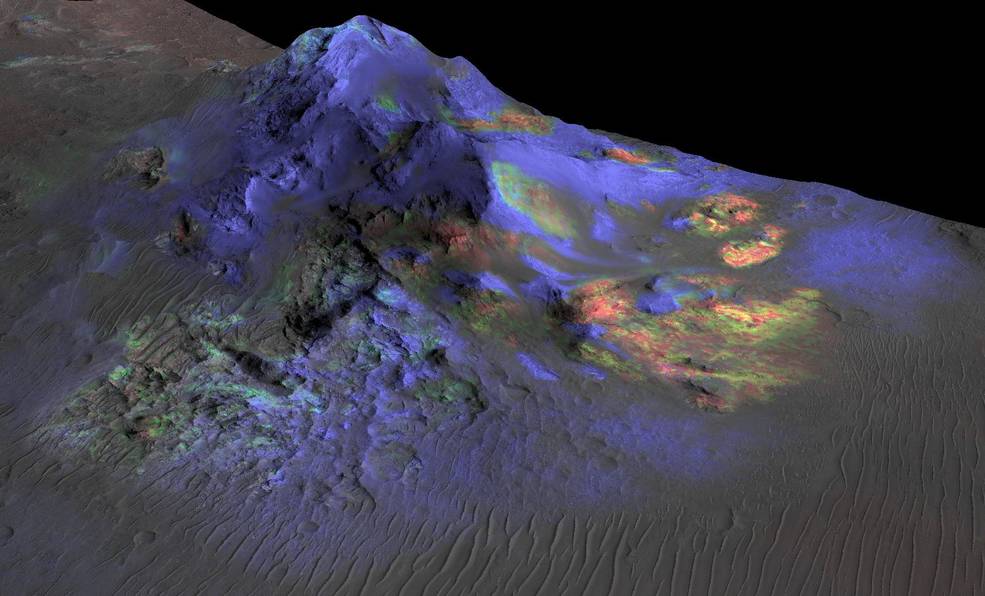 CRISM data was superimposed onto an image of Mars’ Alga Crater. Each color represents a different material: blue for pyroxene, red for olivine, and green for impact glass, which forms in the heat of a violent impact that excavates a crater.
