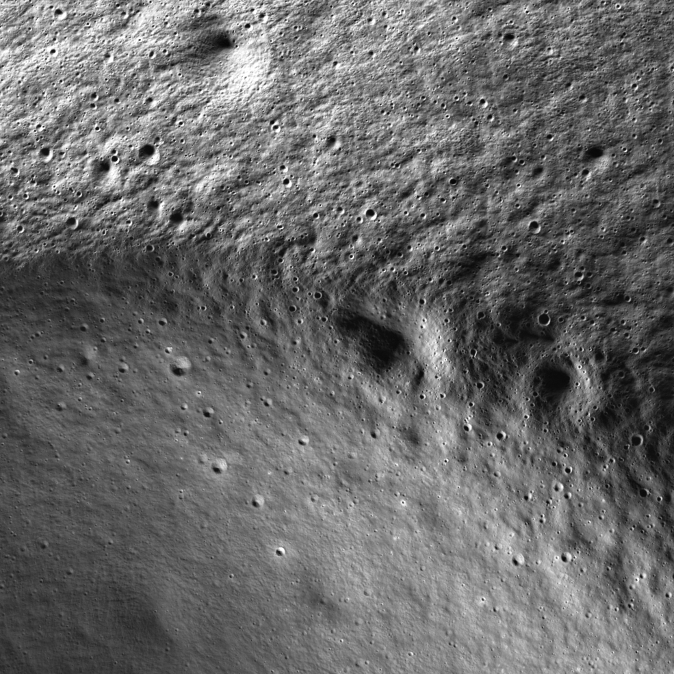 The rim of Marvin crater on the lunar surface captured using secondary illumination, or sunlight reflected off the Moon's geologic features. 