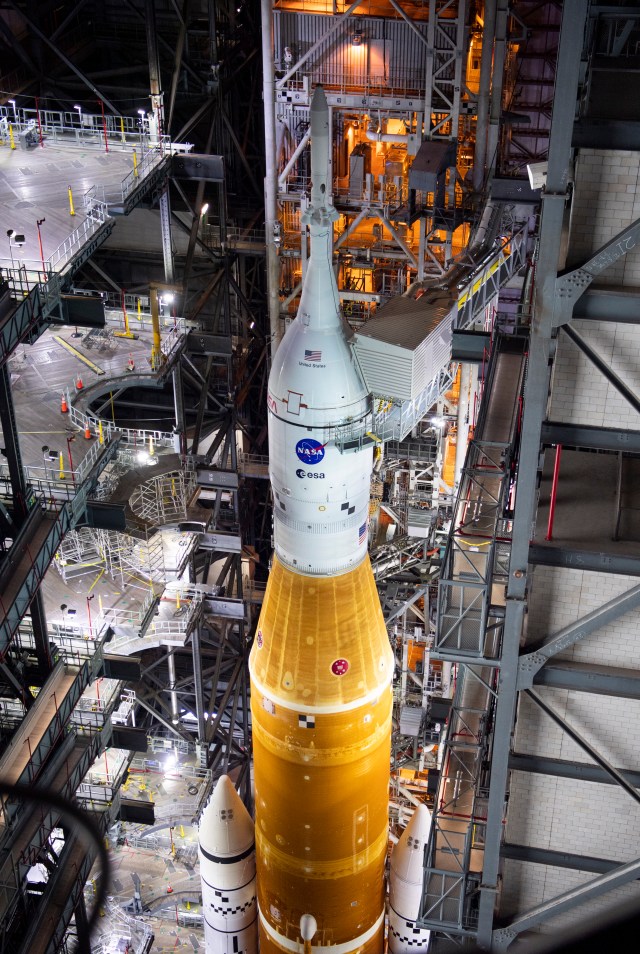 NASA’s Space Launch System (SLS) rocket with the Orion spacecraft aboard is seen atop a mobile launcher in High Bay 3 of the Vehicle Assembly Building before rolling out to Launch Complex 39B for the first time, Wednesday, March 16, 2022