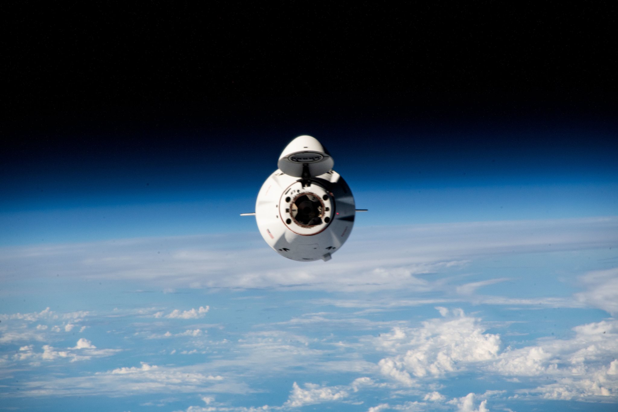 The SpaceX Dragon resupply ship approaches the International Space Station carrying more than 6,200 pounds of science experiments, crew supplies, and other cargo, to replenish the Expedition 68 crew. Both spacecraft were flying 269 miles above the Indian Ocean near Madagascar at the time of this photograph.